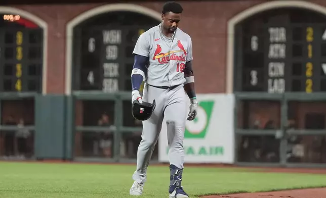 St. Louis Cardinals' Jordan Walker walks to the dugout after hitting into a double play during the sixth inning of a baseball game against the San Francisco Giants, Tuesday, Sept. 8, 2026, in San Francisco. (AP Photo/Jeff Chiu)