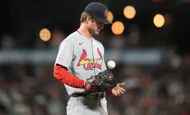St. Louis Cardinals pitcher Quinn Mathews reacts on the mound after walking San Francisco Giants' Bryce Eldridge during the fifth inning of a baseball game, Tuesday, Sept. 8, 2026, in San Francisco. (AP Photo/Jeff Chiu)