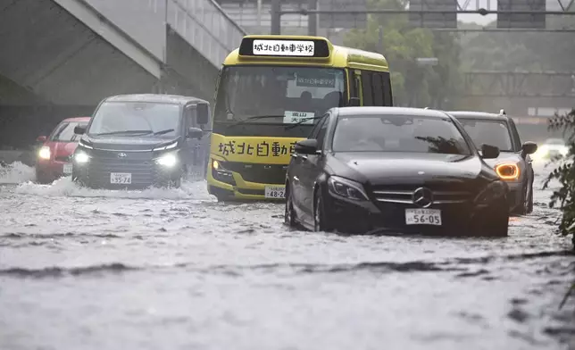 A street is flooded following a heavy rain in Nagoya, central Japan Tuesday, Sept. 8, 2026. (Kazushi Kurihara/Kyodo News via AP)