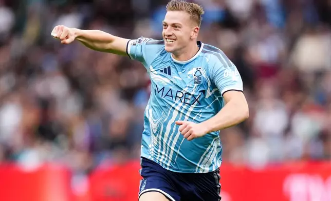 Nottingham Forest's Liam Delap celebrates scoring the opening goal during the English Premier League soccer match between Aston Villa and Nottingham Forest in Birmingham, England, Saturday Sept. 12, 2026. (Nick Potts/PA via AP)