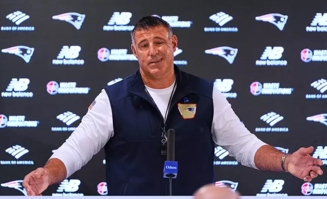 New England Patriots head coach Mike Vrabel talks with the media prior to an NFL football practice, Thursday, Sept. 3, 2026, in Foxborough, Mass. (AP Photo/Charles Krupa)