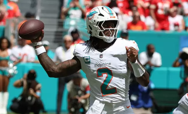 Miami Dolphins quarterback Malik Willis looks to pass the ball during an NFL football game against the Kansas City Chiefs, Sunday, Sept. 27, 2026, in Miami Gardens. (AP Photo/David Santiago)