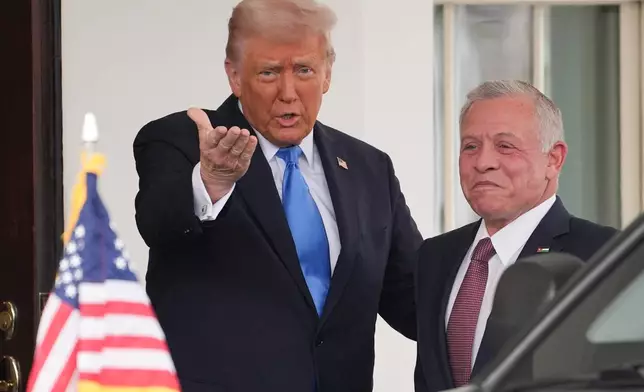 FILE - President Donald Trump greets Jordan's King Abdullah II at the White House, Tuesday, Feb. 11, 2025, in Washington. (AP Photo/Evan Vucci, File)