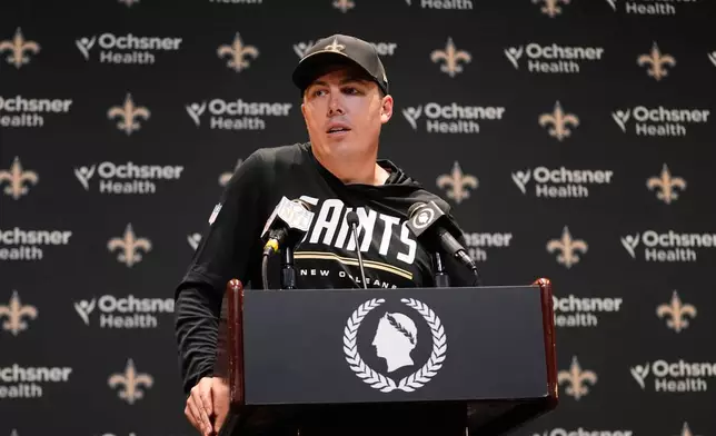 New Orleans Saints head coach Kellen Moore responds to a question during a news conference after an NFL football game against the Las Vegas Raiders in New Orleans, Sunday, Sept. 27, 2026. (AP Photo/Gerald Herbert)