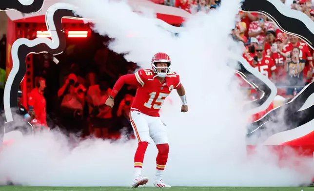 Kansas City Chiefs quarterback Patrick Mahomes takes the field prior to an NFL football game against the Denver Broncos, Monday, Sept. 14, 2026, in Kansas City, Mo. (AP Photo/Colin E. Braley)