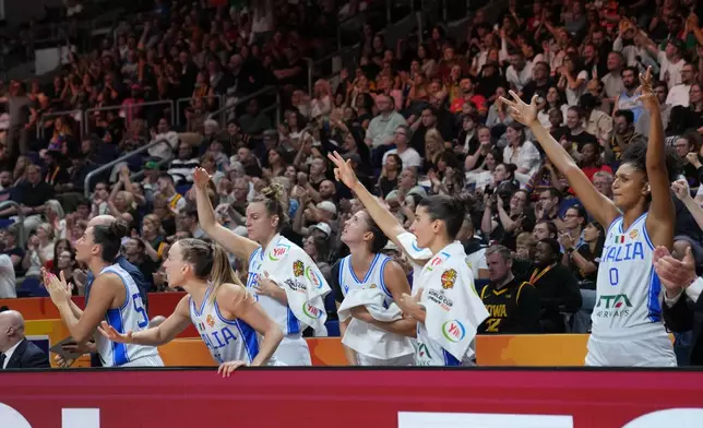 Italian players react during the Women's Basketball World Cup match between the United States and Italy in Berlin, Sunday, Sept. 6, 2026. (AP Photo/Ebrahim Noroozi)