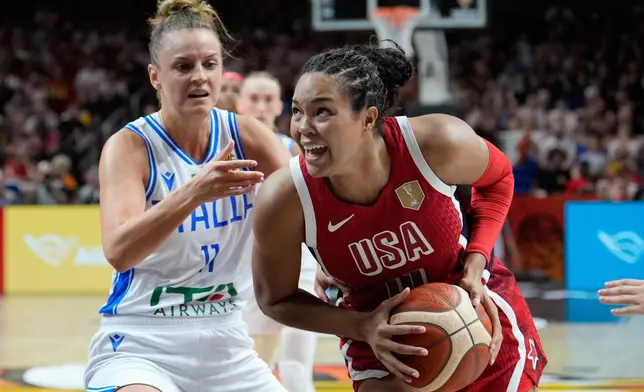 Italy's Francesca Pan guards Napheesa Collier, of the United States, during the Women's Basketball World Cup match between the United States and Italy in Berlin, Sunday, Sept. 6, 2026. (AP Photo/Ebrahim Noroozi)