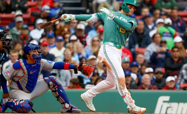 Boston Red Sox' Roman Anthony hits a triple during the seventh inning of the first baseball game of a doubleheader against the Chicago Cubs, Friday, Sept. 25, 2026, in Boston. (AP Photo/Greg M. Cooper)