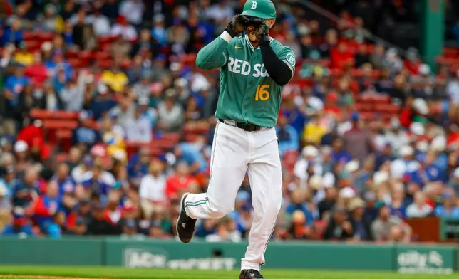 Boston Red Sox' Jarren Duran reacts after drawing a walk during the fourth inning in the first baseball game of a doubleheader against the Chicago Cubs, Friday, Sept. 25, 2026, in Boston. (AP Photo/Greg M. Cooper)