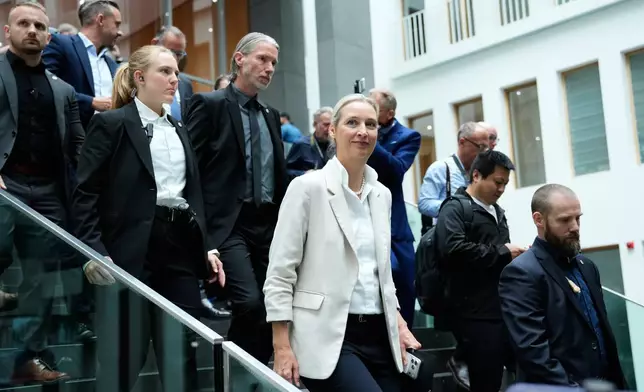 Co-leader of Alternative for Germany party, or AfD, Alice Weidel, leaves for a press conference in Berlin, Germany, Monday, Sept. 7, 2026. (AP Photo/Ebrahim Noroozi)