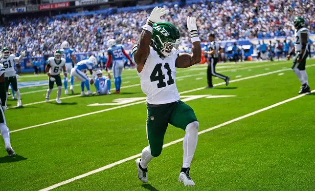 New York Jets linebacker Marcelino McCrary-Ball (41) celebrates a fumble recovery on a kick-off to the Tennessee Titans, during the first half of an NFL football game Sunday, Sept. 13, 2026, in Nashville, Tenn. (AP Photo/John Amis)