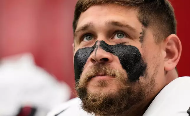 Houston Texans guard Wyatt Teller watches from the bench during the first half of an NFL football game against the Buffalo Bills, Sunday, Sept. 13, 2026, in Houston. (AP Photo/Ashley Landis)