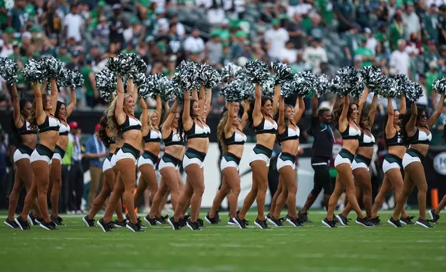 Philadelphia Eagles cheerleaders perform before an NFL football game between the Philadelphia Eagles and the Washington Commanders, Sunday, Sept. 13, 2026, in Philadelphia. (AP Photo/Matt Rourke)