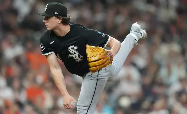 Chicago White Sox relief pitcher Grant Taylor follows through on a pitch during the seventh inning in Game 1 of baseball's American League Wild Card Series against the Houston Astros, Tuesday, Sept. 29, 2026, in Houston. (AP Photo/Karen Warren