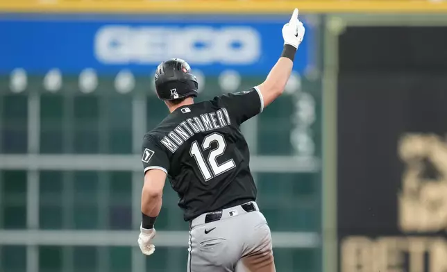 Chicago White Sox's Colson Montgomery (12) runs the bases after hitting a solo home run during the fourth inning in Game 1 of baseball's American League Wild Card Series against the Houston Astros, Tuesday, Sept. 29, 2026, in Houston. (AP Photo/Karen Warren)