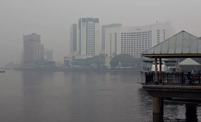 Kuching riverside in the city center is shrouded in thick haze in Kuching, Sarawak state, Malaysia, Friday, Sept. 4, 2026. (AP Photo/Xpin Voon)
