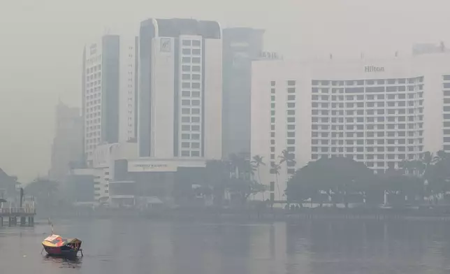 Kuching riverside in the city center is shrouded in thick haze in Kuching, Sarawak state, Malaysia, Friday, Sept. 4, 2026. (AP Photo/Xpin Voon)