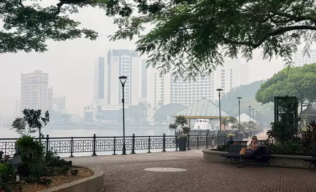 Kuching riverside in the city center is shrouded in thick haze in Kuching, Sarawak state, Malaysia, Friday, Sept. 4, 2026. (AP Photo/Xpin Voon)