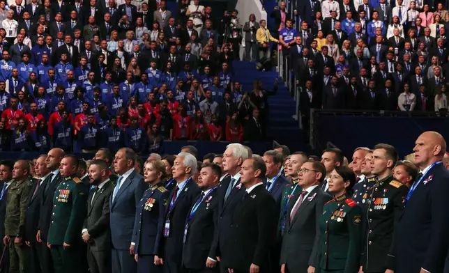 Participants of the United Russia party congress sing the Russian national anthem in Moscow, Saturday, Aug. 22, 2026. (Ekaterina Shtukina/Sputnik Pool Photo via AP, File)