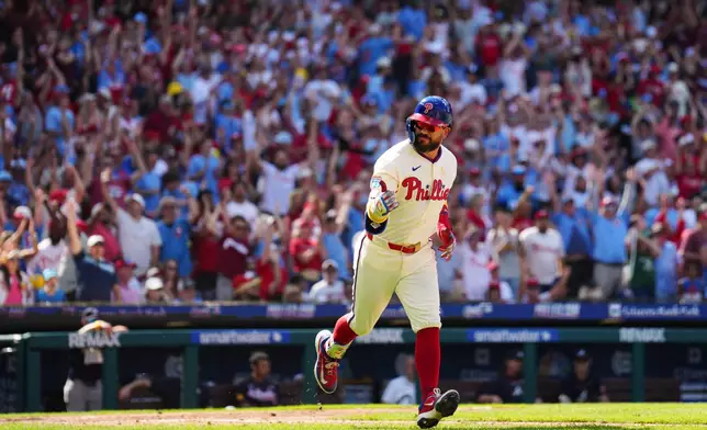 Philadelphia Phillies' Kyle Schwarber reacts after hitting a solo home run off Atlanta Braves pitcher Dylan Dodd during the seventh inning of a baseball game, Sunday, Sept. 6, 2026, in Philadelphia. (AP Photo/Derik Hamilton)