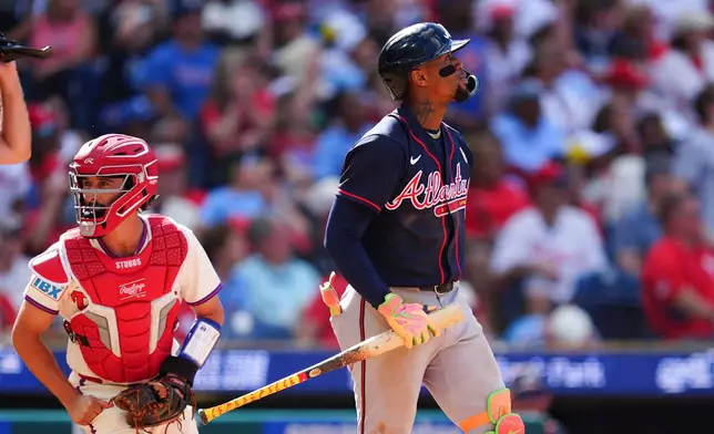 Atlanta Braves' Ronald Acuña Jr. watches his three-run home run off Philadelphia Phillies pitcher Alex McFarlane during the eighth inning of a baseball game, Sunday, Sept. 6, 2026, in Philadelphia. (AP Photo/Derik Hamilton)