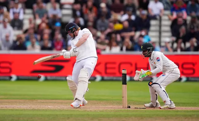 England's Jordan Cox plays a shot on day four of the third cricket Test at Edgbaston, in Birmingham, England, Saturday, Sept. 12, 2026. (Mike Egerton/PA via AP)