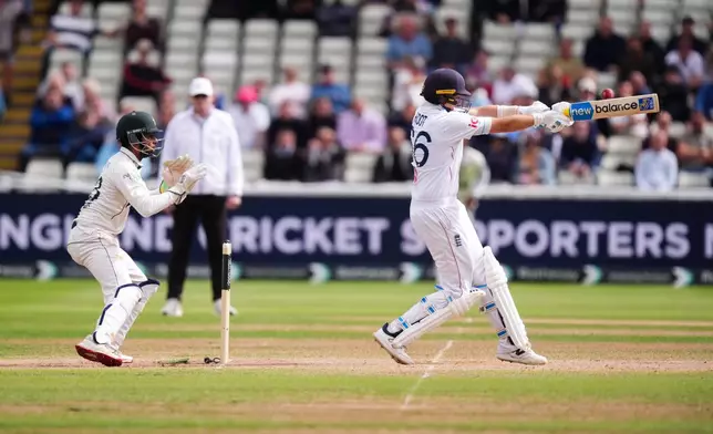 England's Joe Root hits the ball on day four of the third cricket Test at Edgbaston, in Birmingham, England, Saturday, Sept. 12, 2026. (Mike Egerton/PA via AP)