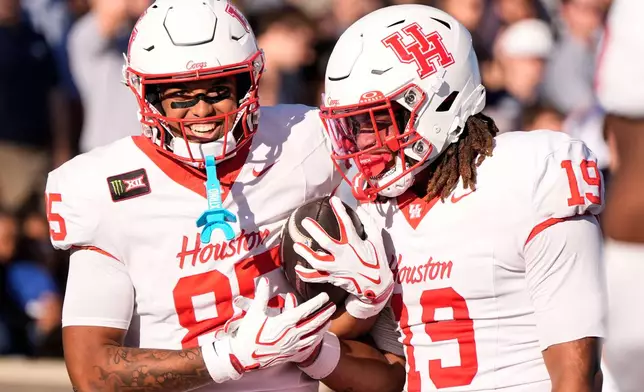 Houston tight end Traville Frederick Jr. (85) celebrates his touchdown against Georgia Southernm in the first half of an NCAA football game, Saturday, Sept. 26, 2026, in Statesboro, Ga. (AP Photo/Mike Stewart)