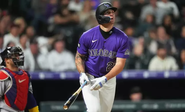Colorado Rockies' Mickey Moniak heads up the first-base line after connecting for a solo home run off Colorado Rockies starting pitcher Kyle Freeland in the third inning of a baseball game Tuesday, Sept. 22, 2026, in Denver. (AP Photo/David Zalubowski)