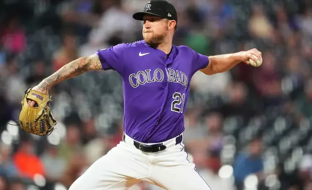 Colorado Rockies starting pitcher Kyle Freeland works against the Arizona Diamondbacks in the first inning of a baseball game Tuesday, Sept. 22, 2026, in Denver. (AP Photo/David Zalubowski)