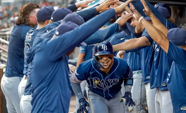Tampa Bay Rays' Victor Mesa Jr. celebrates in the dugout after hitting a solo home run against the Atlanta Braves during the second inning of a baseball game, Wednesday, Sept. 9, 2026, in Atlanta. (AP Photo/Erik S. Lesser)