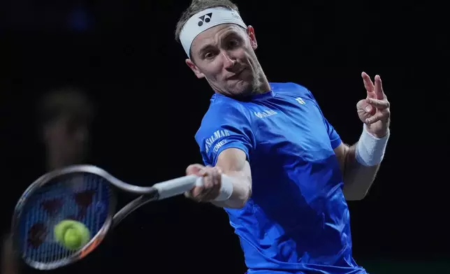 Team Europe's Casper Ruud plays a return to Team World's Francisco Cerundolo during a Laver Cup tennis tournament match in London, Friday, Sept. 25, 2026. (AP Photo/Maja Smiejkowska)