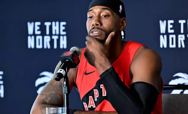 Toronto Raptors forward Kawhi Leonard speaks at the Raptors media day in Toronto on Monday, Sept. 28, 2026. (Jon Blacker/The Canadian Press via AP)