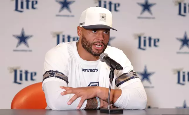 Dallas Cowboys quarterback Dak Prescott speaks during a practice for an NFL football game against the Baltimore Ravens in Rio de Janeiro, Friday, Sept. 25, 2026. (AP Photo/Lucas Figueiredo)