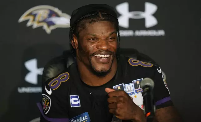 Baltimore Ravens quarterback Lamar Jackson speaks after a practice for an NFL football game against the Dallas Cowboys in Rio de Janeiro, Friday, Sept. 25, 2026. (AP Photo/Andre Penner)