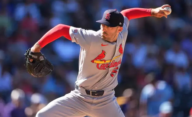 St. Louis Cardinals relief pitcher Cooper Hjerpe works against the Colorado Rockies in the seventh inning of a baseball game Sunday, Sept. 6, 2026, in Denver. (AP Photo/David Zalubowski)