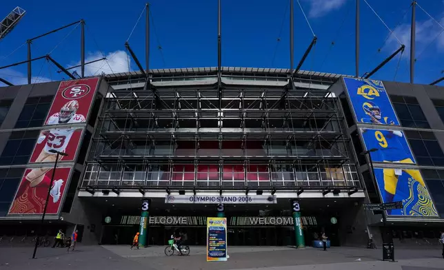 Outside the Melbourne Cricket Ground Wednesday, Sept. 9, 2026, in Melbourne, Australia, ahead of the NFL football game between the Los Angeles Rams and San Francisco 49ers. (AP Photo/Asanka Brendon Ratnayake)