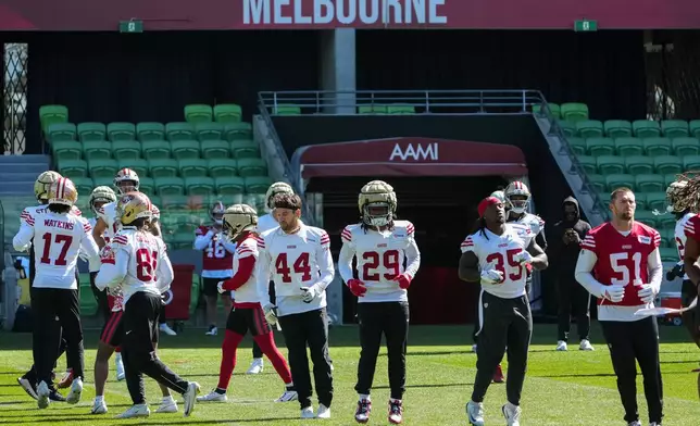 San Francisco 49ers players work out during a practice Wednesday, Sept. 9, 2026, in Melbourne, Australia, in preparation for an NFL football game against the Los Angeles Rams. (AP Photo/Asanka Brendon Ratnayake)