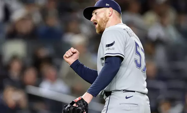 Tampa Bay Rays pitcher Drew Rasmussen reacts after the final out in the sixth inning during the second baseball game of a doubleheader against the New York Yankees, Tuesday, Sept. 22, 2026, in New York. (AP Photo/Adam Hunger)
