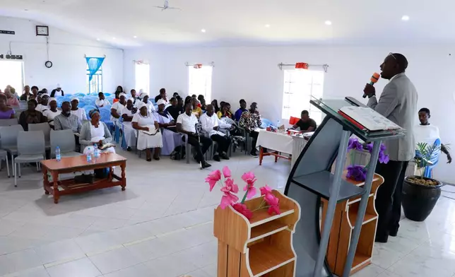 Senior Pastor Kennedy Shiverenje of Friends Church Cheptulu delivers a sermon during mass in Kaimosi, Kenya, Sunday, Sept. 20, 2026. (AP Photo/Jackson Njehia)