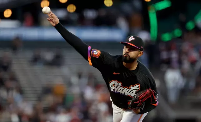 San Francisco Giants pitcher Anthony Molina throws against the Minnesota Twins during the first inning of a baseball game in San Francisco, Tuesday, Sept. 22, 2026. (AP Photo/Jed Jacobsohn)