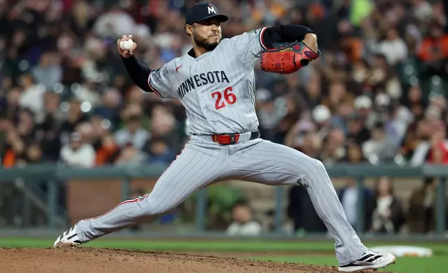 Minnesota Twins pitcher Taj Bradley throws against the San Francisco Giants during the fourth inning of a baseball game in San Francisco, Tuesday, Sept. 22, 2026. (AP Photo/Jed Jacobsohn)