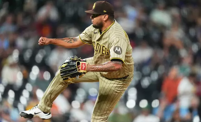 San Diego Padres relief pitcher Bradgley Rodriguez works against the Colorado Rockies in the sixth inning of a baseball game Monday, Sept. 14, 2026, in Denver. (AP Photo/David Zalubowski)