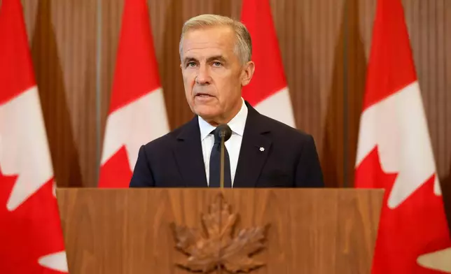 Prime Minister Mark Carney speaks about Canada's response to new U.S. tariffs during a news conference on Parliament Hill in Ottawa on Saturday, Aug. 22, 2026. (Patrick Doyle/The Canadian Press via AP)