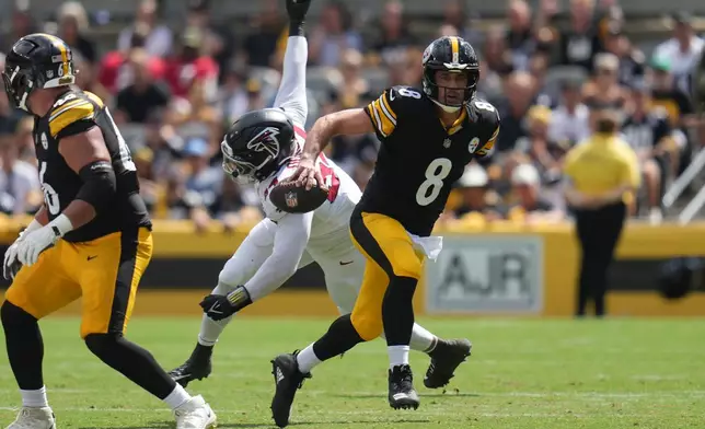 Pittsburgh Steelers quarterback Aaron Rodgers (8) runs the ball during an NFL football game against the Atlanta Falcons, Sunday, Sept. 13, 2026, in Pittsburgh. (AP Photo/Gene J. Puskar)