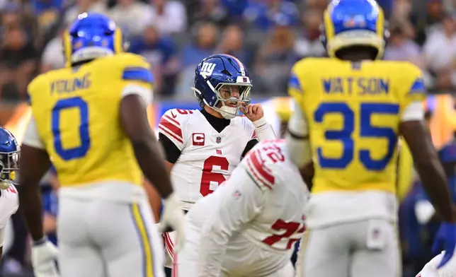 New York Giants quarterback Jaxson Dart (6) steps to the line of scrimmage during the first half of an NFL football game against the Los Angeles Rams in Inglewood, Calif., Monday, Sept. 21, 2026. (AP Photo/Katie Chin)