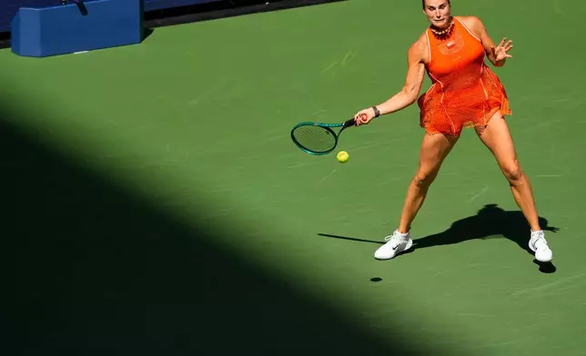 Aryna Sabalenka, of Belarus, returns the ball to Linda Noskova, of the Czech Republic, during the quarterfinal round of the U.S. Open tennis championships, Tuesday, Sept. 8, 2026, in New York. (AP Photo/Yuki Iwamura)