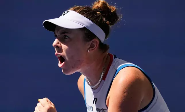 Linda Noskova, of the Czech Republic, reacts during a match against Aryna Sabalenka, of Belarus, during the quarterfinal round of the U.S. Open tennis championships, Tuesday, Sept. 8, 2026, in New York. (AP Photo/Seth Wenig)