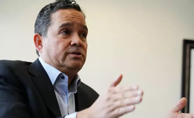 Attorney Robert Pastor discusses a lawsuit he filed regarding the December 2022 death of a 9-year-old boy after staying at a group home operated by Sunshine Residential Homes, in Phoenix on Wednesday, Jan. 29, 2025. (AP Photo/Ross D. Franklin)