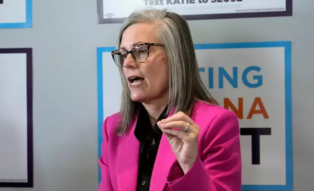 Arizona Democratic Gov. Katie Hobbs speaks during a political announcement, Monday, Aug. 10, 2026, in Phoenix. (AP Photo/Ross D. Franklin)
